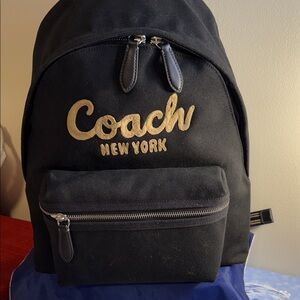 Coach Black Backpack with Gold Accents